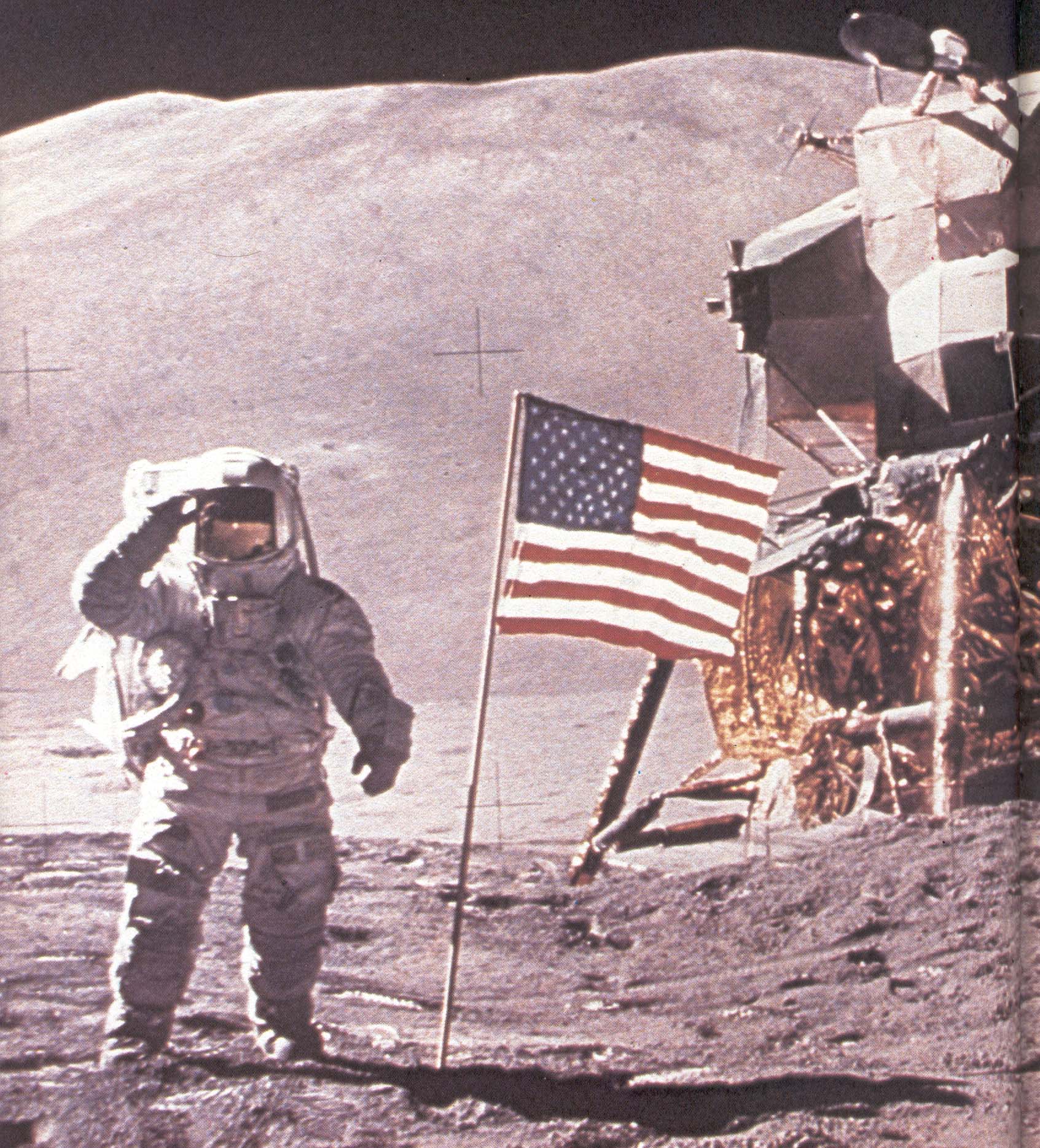 Astronaut on the moon by lunar lander and American flag.